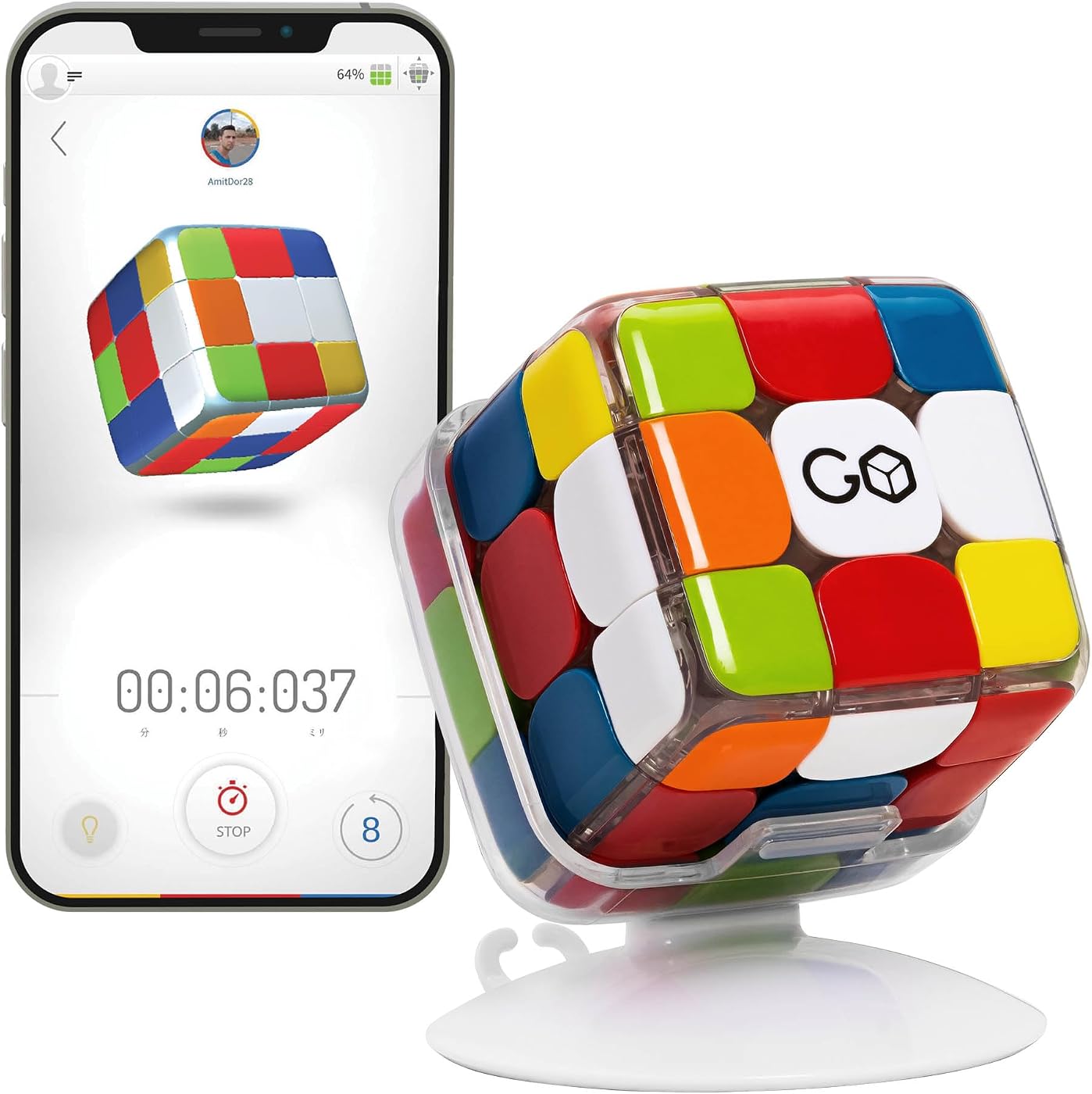 A GoCube smart cube on its stand beside a phone running the timer